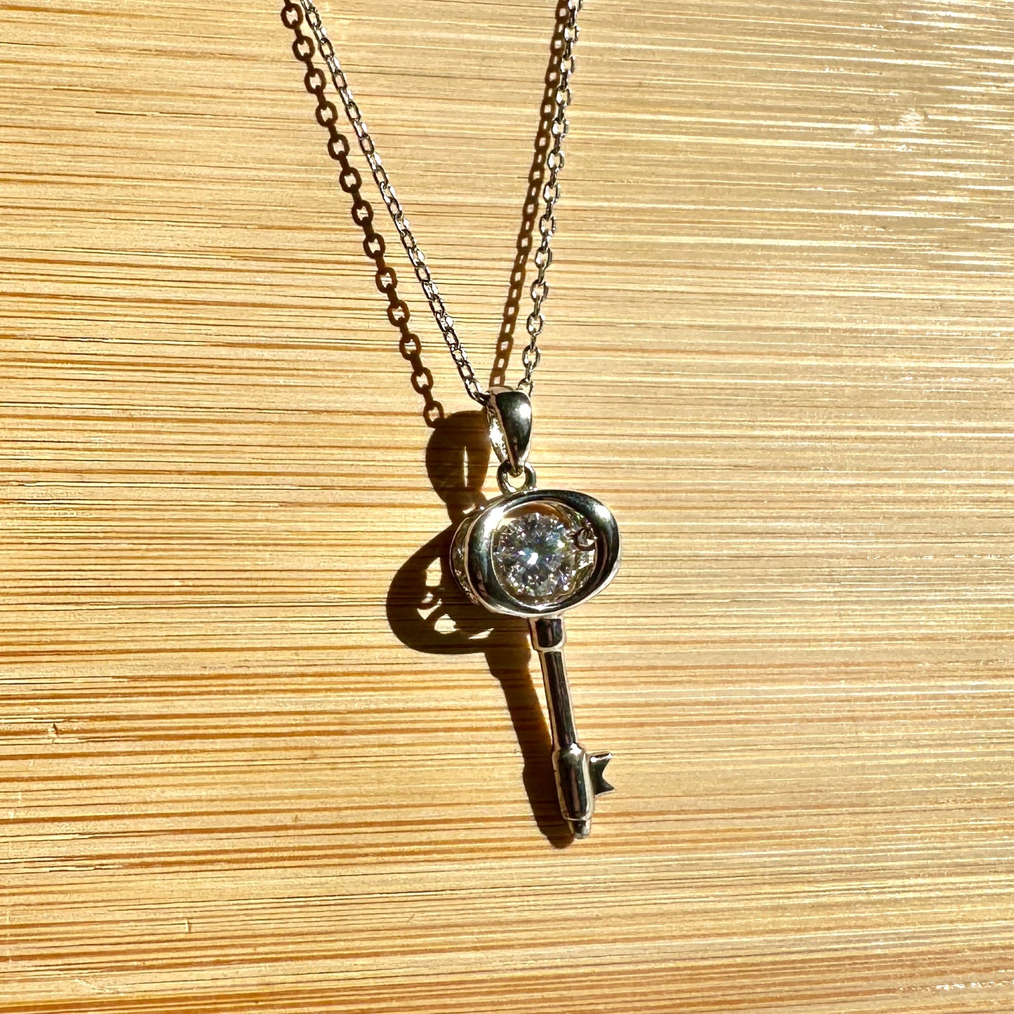 Dancing Diamond 'Key to My Heart' Sterling Silver Moissanite Pendant